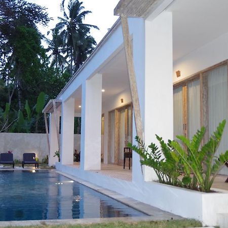 Bali Taman Sari Villas & Restaurant Пулукан Экстерьер фото
