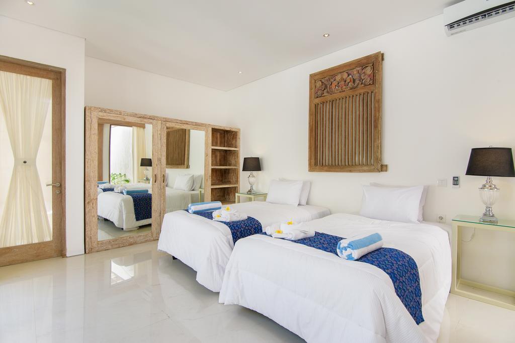 Bali Taman Sari Villas & Restaurant Пулукан Экстерьер фото