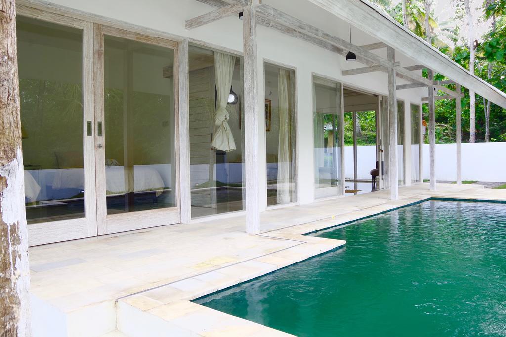 Bali Taman Sari Villas & Restaurant Пулукан Экстерьер фото